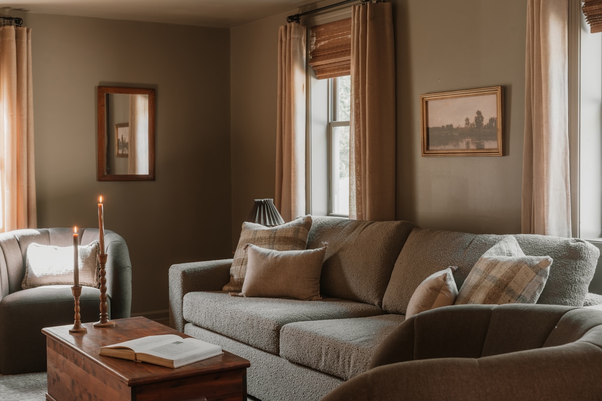 Living room with framed artwork above a sofa
